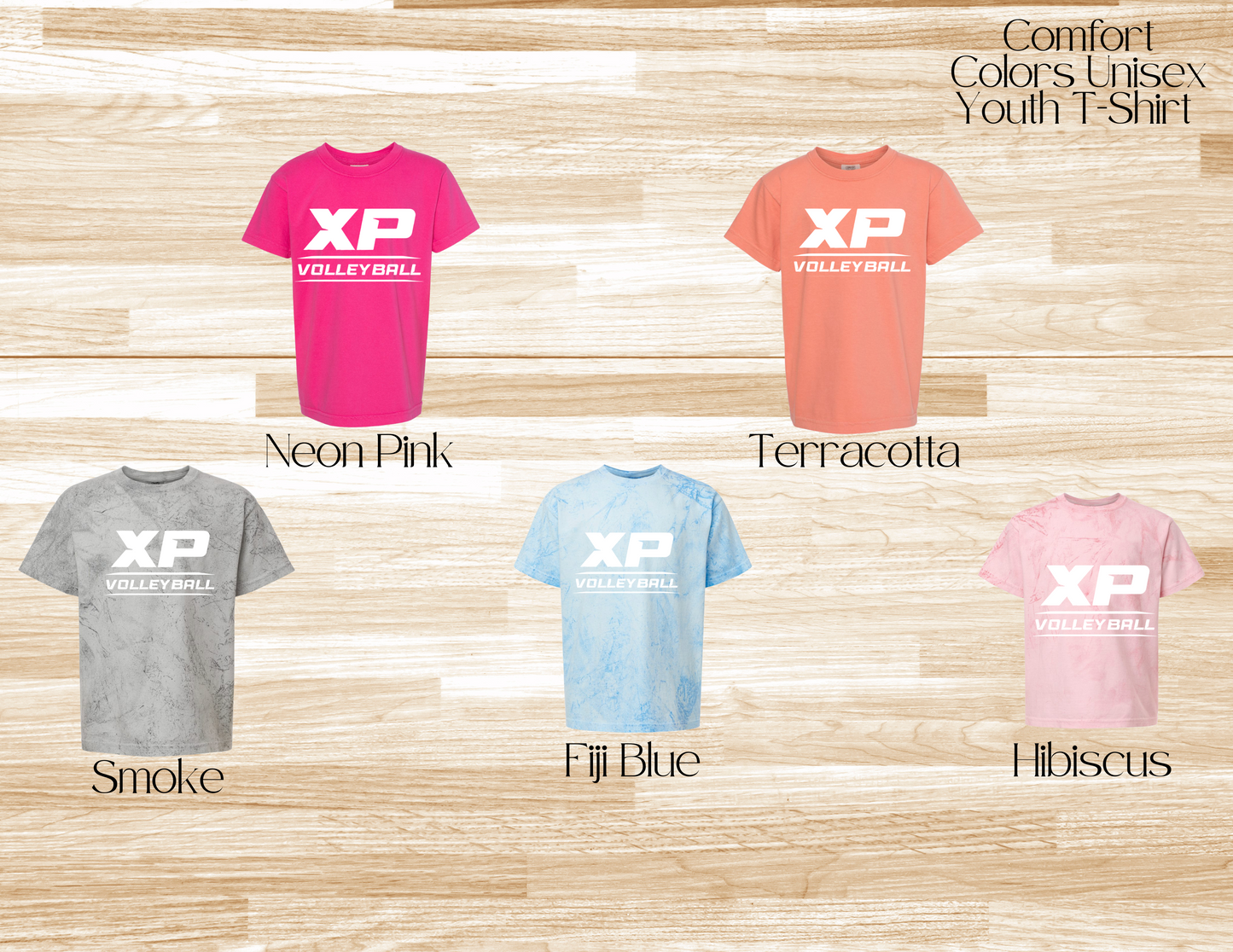 Collection of XP Volleyball t-shirts in various colors on a wooden surface.