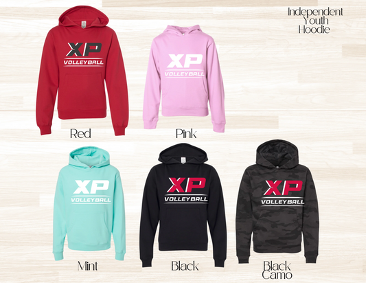 Collection of XP Volleyball hoodies in various colors on a light wooden background.